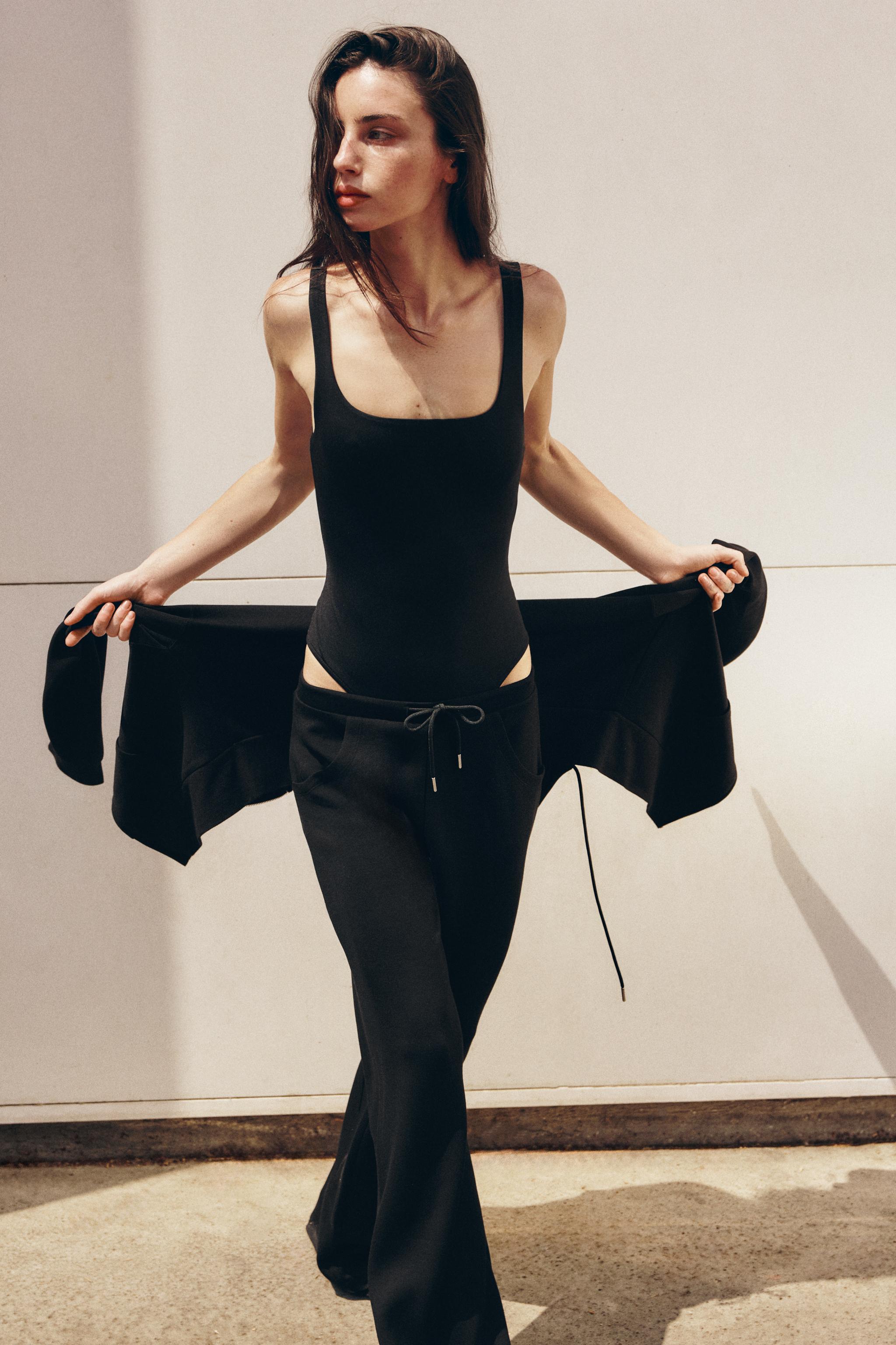 INTERLOCK FLARED PANTS